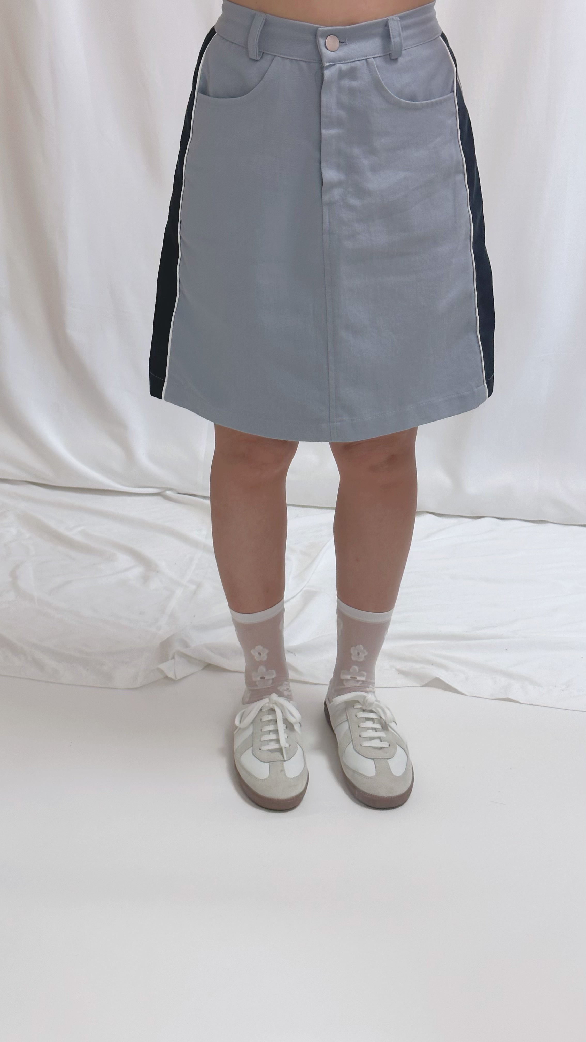 撞色邊半截裙/淺藍